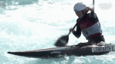 A Man Is Paddling A Kayak In The Water With A Paddle And A Sticker That Says Leibfartl GIF