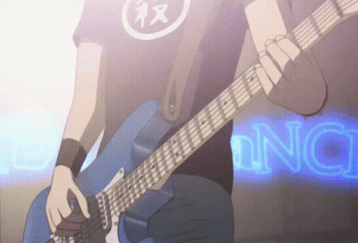 A Man Is Playing A Guitar In Front Of A Neon Sign That Says " Nc " GIF