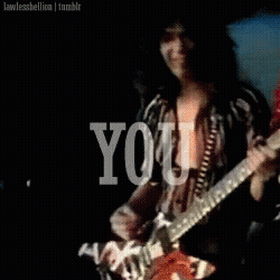 A Man Is Playing A Guitar With The Word You Behind Him GIF