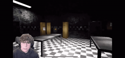 A Man Is Playing A Video Game In A Dark Room With Checkered Floors GIF