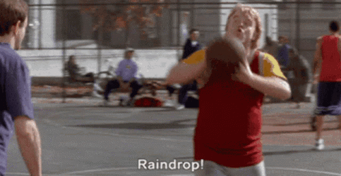 A Man Is Playing Basketball On A Court And Saying Raindrop . GIF