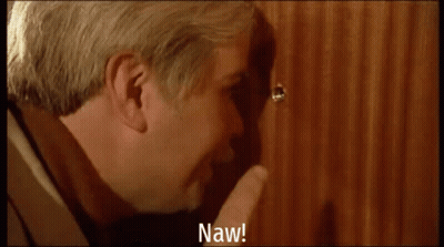 A Man Is Pointing At A Door With The Words Naw Written On The Bottom GIF