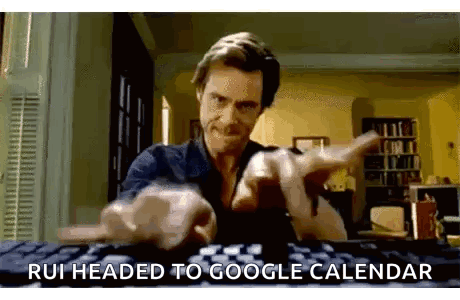 A Man Is Pointing At The Camera While Typing On A Keyboard And Says `` Rui Headed To Google Calendar '' . GIF