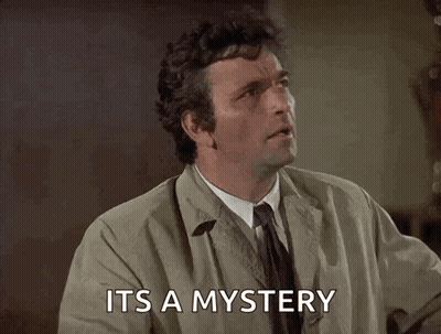 A Man Is Pointing Up And Saying `` It 'S A Mystery '' With His Finger . GIF
