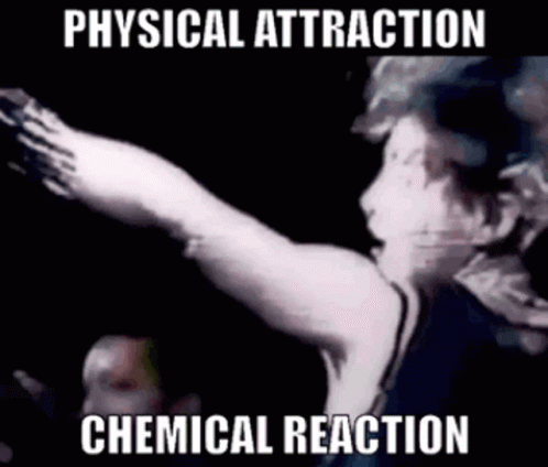 A Man Is Pointing Up In The Air With A Chemical Reaction Written On The Bottom . GIF