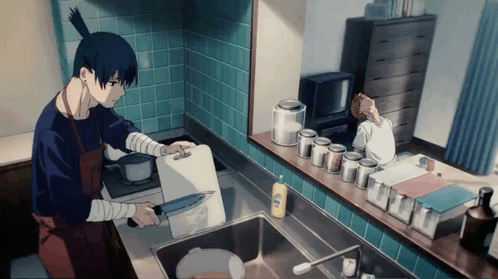 A Man Is Preparing Food In A Kitchen With A Knife And Cutting Board GIF