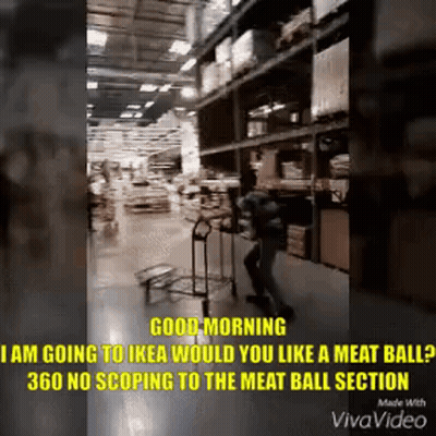A Man Is Pushing A Cart In A Store With The Words Good Morning GIF