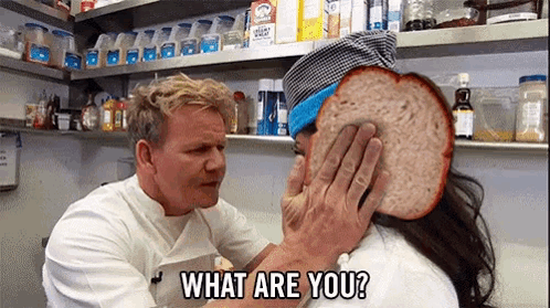 A Man Is Putting A Slice Of Bread On A Woman 'S Face And Asking Her What Are You . GIF