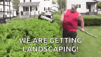A Man Is Raking A Lawn With A Rake In His Backyard . GIF