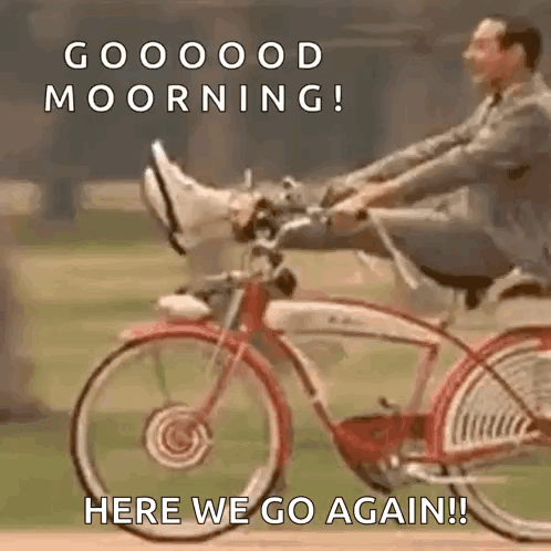 A Man Is Riding A Bicycle With His Feet Up And The Words `` Here We Go Again '' . GIF