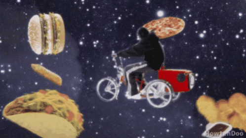 A Man Is Riding A Bike With A Pizza On His Back Surrounded By Food GIF