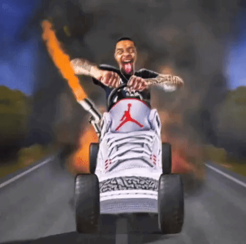 A Man Is Riding A Lawn Mower With A Flamethrower Attached To The Back . GIF