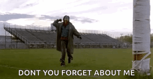 A Man Is Riding A Skateboard On A Field With The Words `` Dont You Forget About Me '' Written On It . GIF