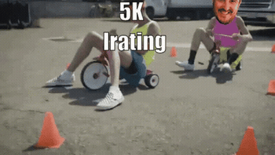 A Man Is Riding A Tricycle With The Words 5K Irating Written On It GIF