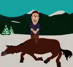A Man Is Riding On The Back Of A Dead Horse GIF