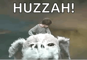 A Man Is Riding On The Back Of A Stuffed Animal With The Words Huzzah . GIF