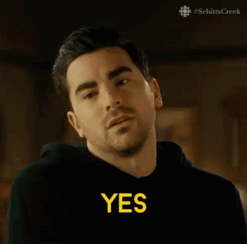 A Man Is Saying `` I Would Like That Very Much '' While Wearing A Black Hoodie . GIF