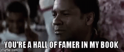A Man Is Saying `` You 'Re A Hall Of Famer In My Book '' In Front Of A Crowd . GIF