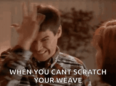 A Man Is Scratching His Head While Talking To A Woman And Says `` When You Cant Scratch Your Weave '' . GIF