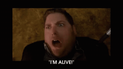 A Man Is Screaming And Saying `` I 'M Alive '' In A Movie . GIF