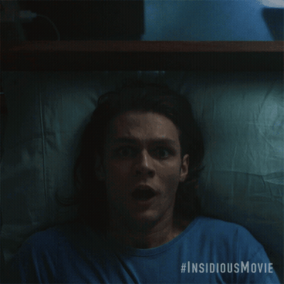 A Man Is Screaming In A Blue Shirt With #Insidiousmovie Written On The Bottom GIF