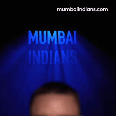 A Man Is Screaming In Front Of A Mumbai Indians Logo GIF