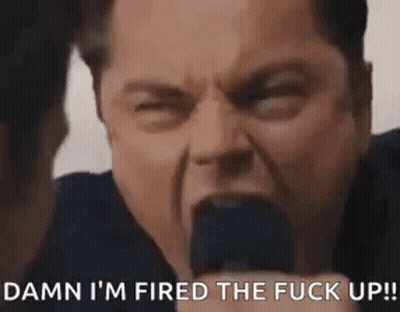 A Man Is Screaming Into A Microphone And Says `` Damn I 'M Fired The Fuck Up '' . GIF