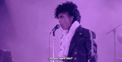 A Man Is Singing Into A Microphone And Asking Do You Want Him . GIF