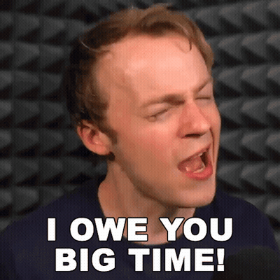 A Man Is Singing Into A Microphone And Saying I Owe You Big Time GIF