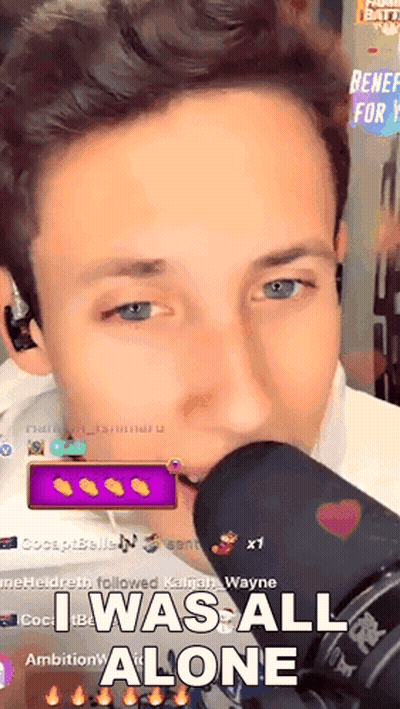 A Man Is Singing Into A Microphone And The Caption Says I Was All Alone GIF