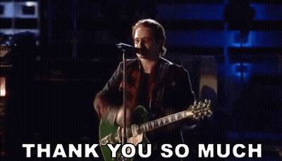 A Man Is Singing Into A Microphone While Holding A Guitar And The Words Thank You So Much Are Below Him GIF