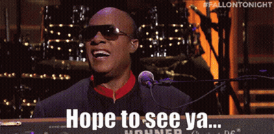 A Man Is Singing Into A Microphone With The Words Hope To See Ya GIF
