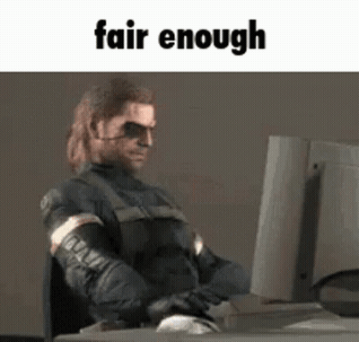 A Man Is Sitting At A Desk In Front Of A Computer With The Words `` Fair Enough '' Written Above Him . GIF