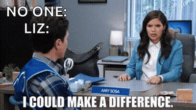 A Man Is Sitting At A Desk Talking To A Woman Who Is Sitting At A Desk . GIF