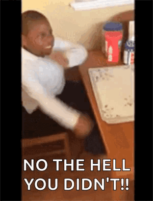 A Man Is Sitting At A Desk With His Arms Outstretched And The Words `` No The Hell You Didn 'T ! '' GIF
