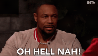A Man Is Sitting At A Table And Says Oh Hell Nah GIF