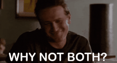 A Man Is Sitting At A Table And Smiling While Asking Why Not Both ? GIF