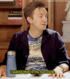 A Man Is Sitting At A Table With A Blue Water Bottle And Says I Guess This Is My Son Now GIF