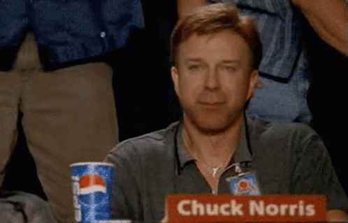 A Man Is Sitting At A Table With A Pepsi Can In Front Of Him . GIF