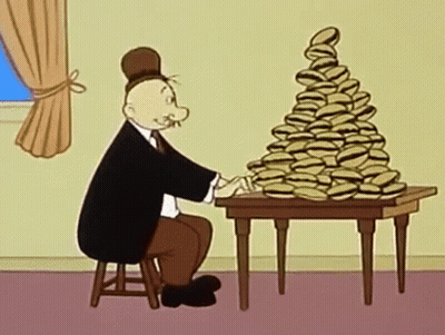 A Man Is Sitting At A Table With A Stack Of Hamburgers On It . GIF