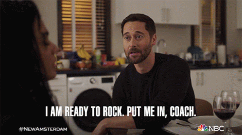 A Man Is Sitting At A Table With A Woman And Says " I Am Ready To Rock " GIF