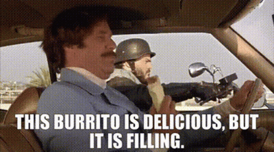 A Man Is Sitting In A Car Eating A Burrito While Another Man Rides A Motorcycle . GIF