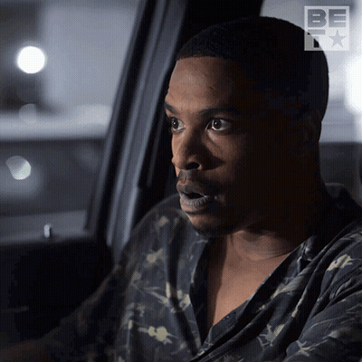 A Man Is Sitting In A Car With A Be Tv Logo On The Side GIF