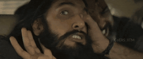 A Man Is Sitting In A Car With The Words Buckle Up Your Seat Be Above Him GIF