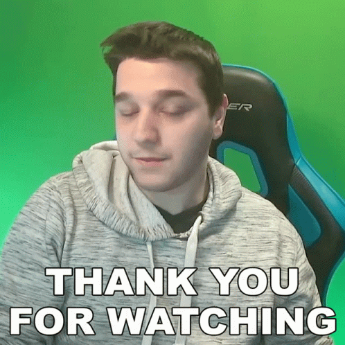 A Man Is Sitting In A Chair And Says Thank You For Watching GIF