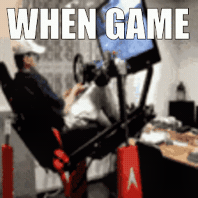 A Man Is Sitting In A Chair Playing A Video Game With The Words When Game Written Above Him GIF