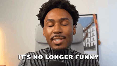 A Man Is Sitting In A Chair With His Eyes Closed And Says `` It 'S No Longer Funny '' GIF
