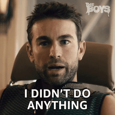 A Man Is Sitting In A Chair With The Words I Did N't Do Anything Behind Him GIF
