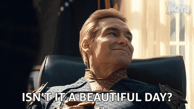 A Man Is Sitting In A Chair With The Words Isn T It A Beautiful Day GIF