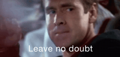 A Man Is Sitting In A Chair With The Words `` Leave No Doubt '' Written On The Screen Behind Him . GIF